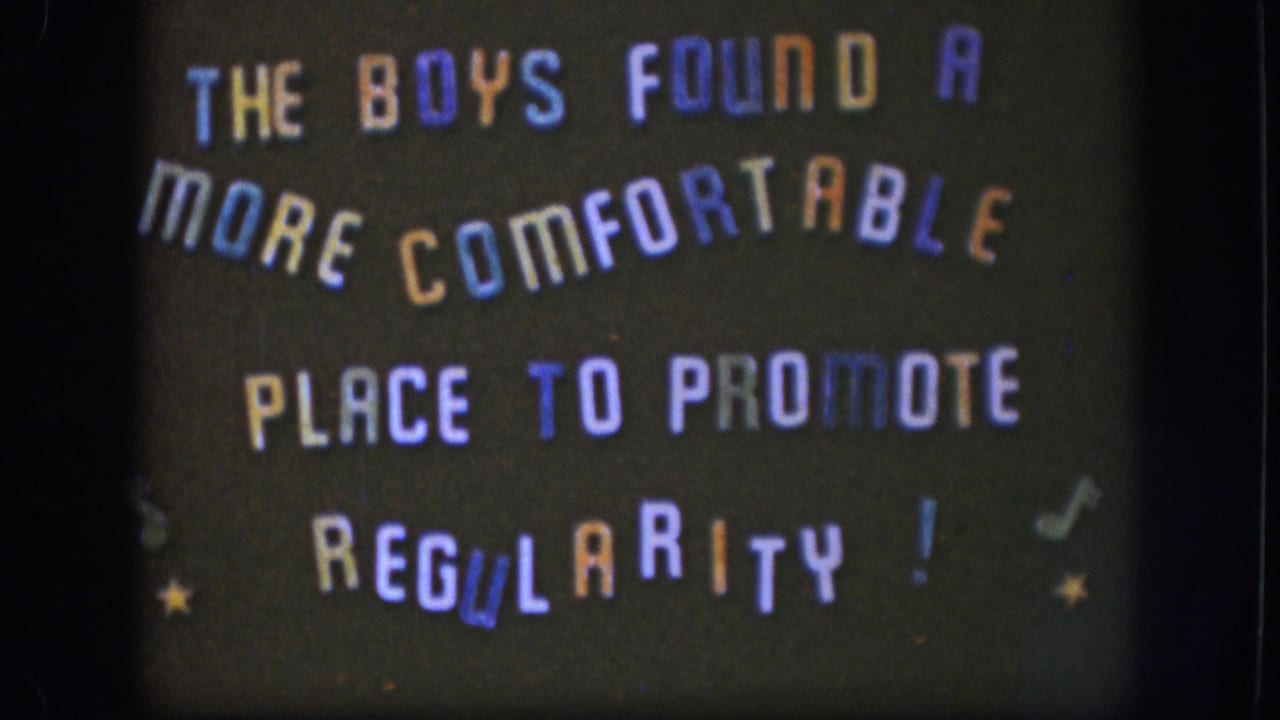 Final 1958 Kansas frame showing the static dark title card with playful multicolored lettering and decorative symbols.
