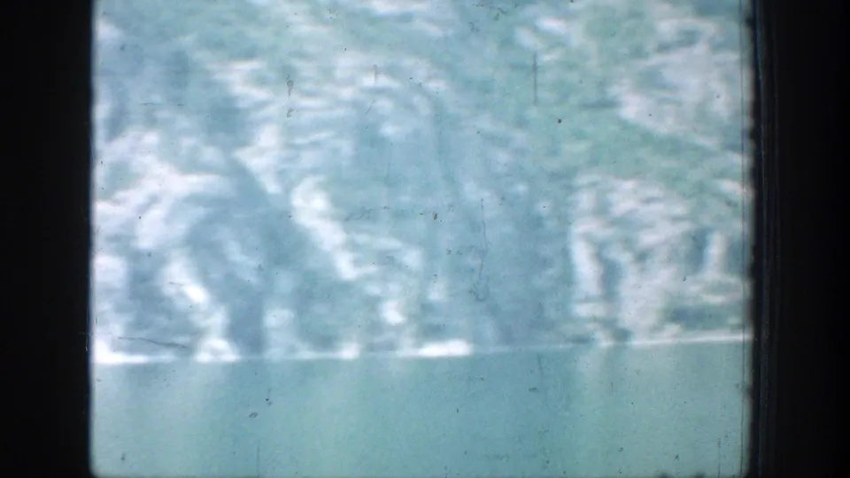 Chelan, Washington lake and mountain view from a window-framed 1939 8mm home movie.