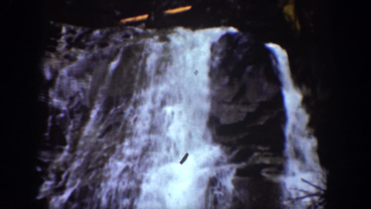 Waterfall cascading over rocks in the 1939 Chelan, Washington home-movie footage.