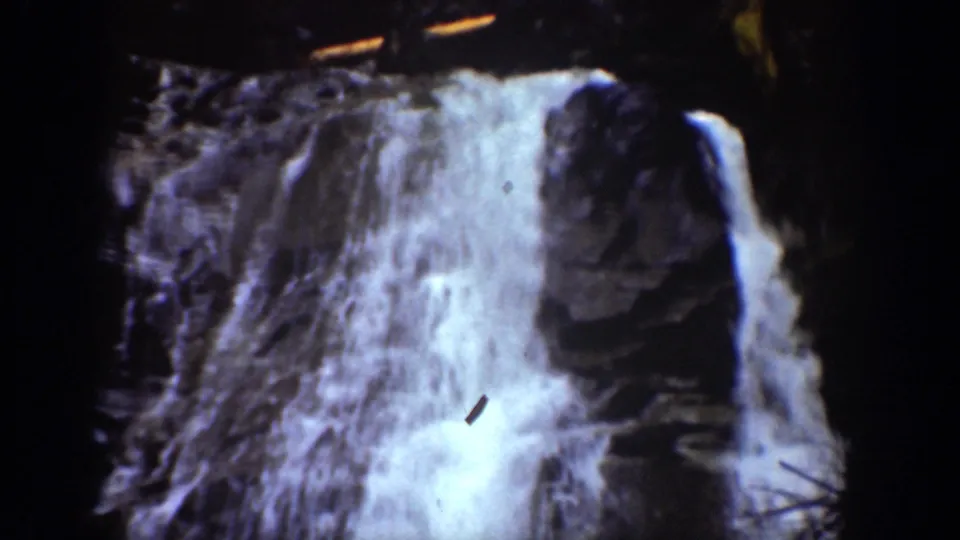 Waterfall cascading over rocks in the 1939 Chelan, Washington home-movie footage.
