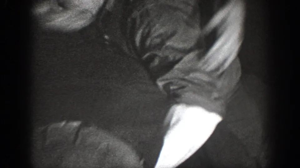 The final frame shows an adult man in a light shirt bent over a dark-clothed figure in the continuing 1939 indoor struggle.