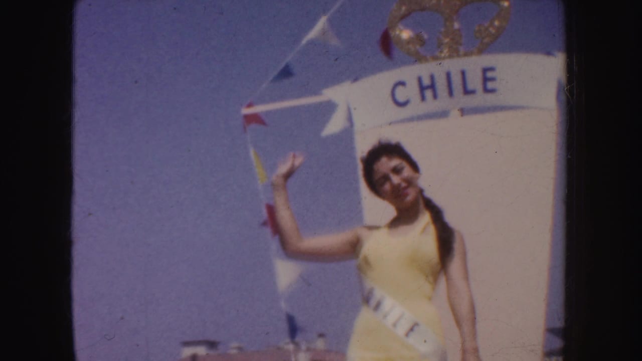 In 1952 California footage, a woman in yellow swimwear and sash waves from a white parade float marked CHILE.
