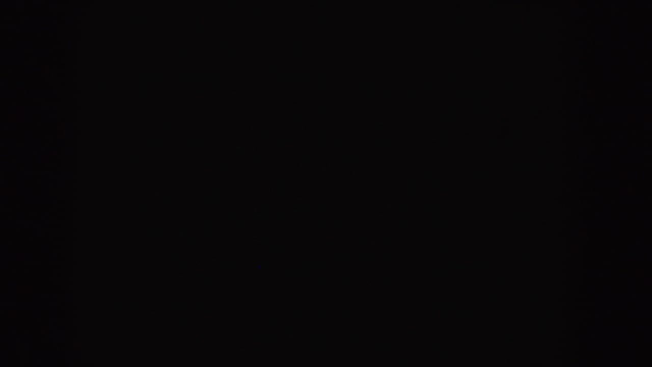 Dark 1955 Idaho 8mm home-movie start frame with faint grain and no visible subject.