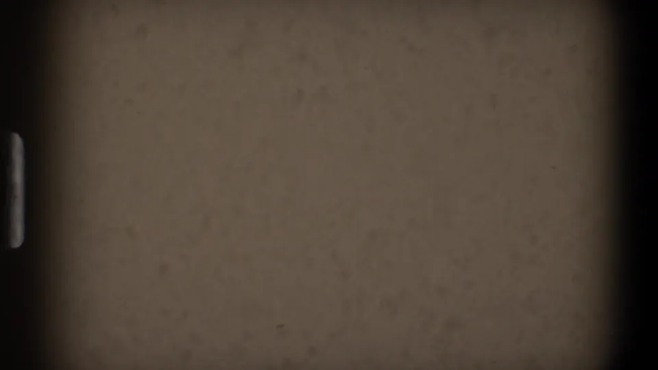 1968 Toledo 8mm frame showing a blank beige surface, faint horizontal line, dark borders, and visible archival grain.