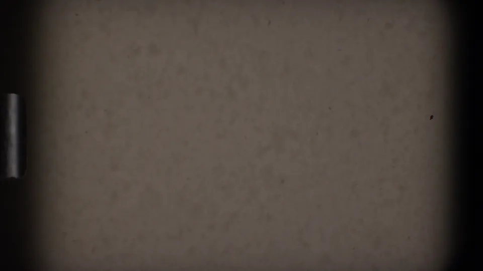 Overexposed 8mm frame with a horizontal frame boundary, dark film borders, and visible grain from the 1968 Toledo footage.