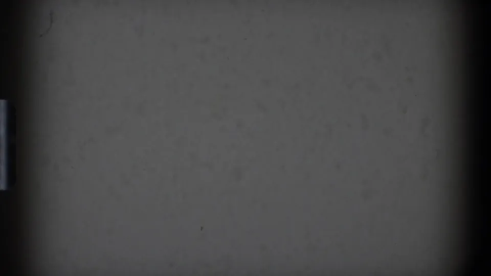 Metadata-supported 1968 Toledo 8mm frame showing gray-white exposure, heavy edge darkening, grain, dust, and sprocket-area marks.