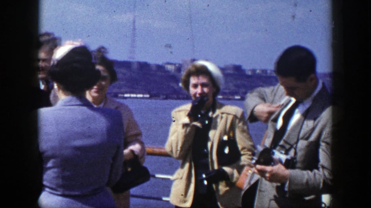 Adults in 1948 New York stand on a riverboat or ferry deck, with cameras, railings, water, and a distant shoreline visible.