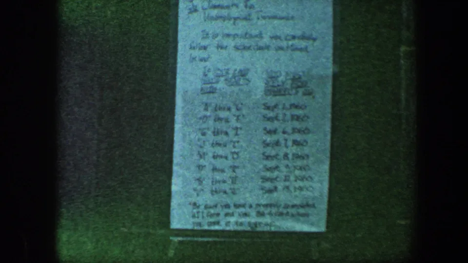 Close view of a handwritten document with dates, likely filmed in Baltimore in 1960 according to clip metadata.