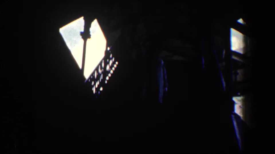 The final contact-sheet frame is largely underexposed, showing a bright angular opening and dark structural shapes rather than the woman.