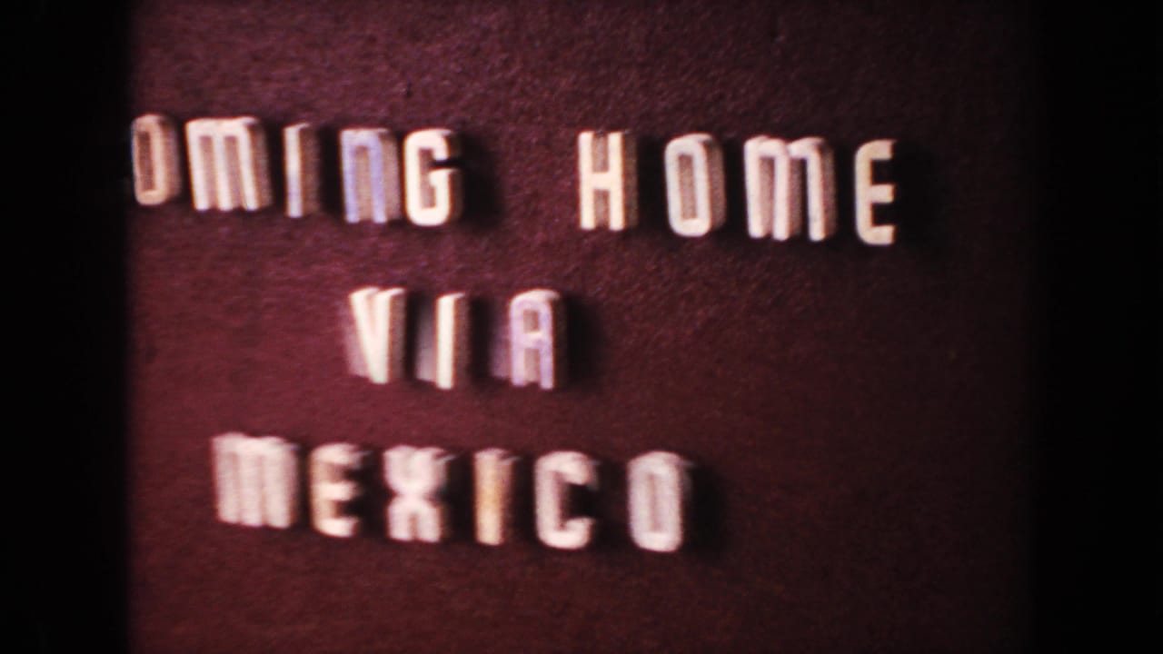 Lettered title card reading 'COMING HOME VIA MEXICO' on a dark background.