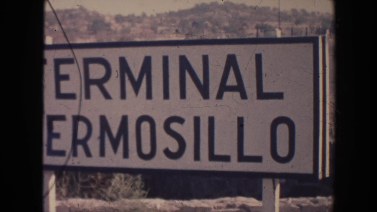 Large roadside sign reading Terminal Hermosillo beside a dusty outdoor area.