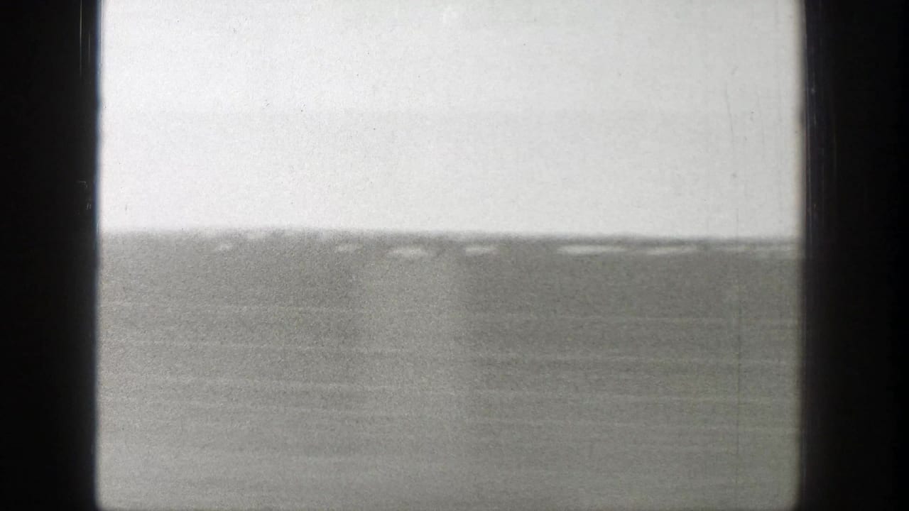 Open Wyoming terrain in soft focus, filmed from a moving vehicle on 8mm stock in 1939.