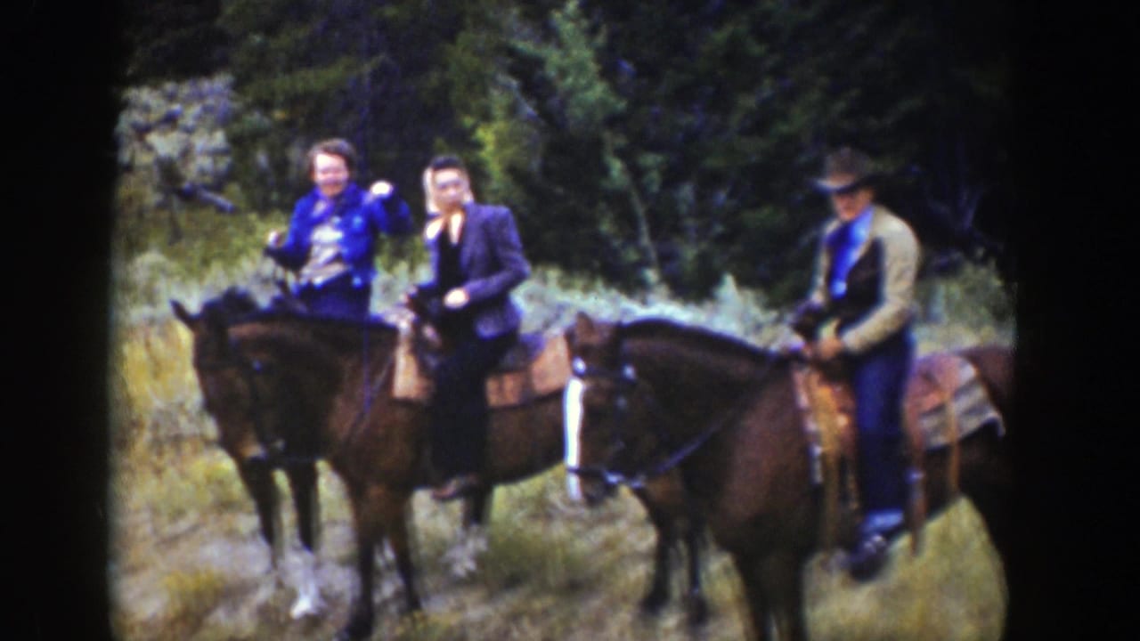 Three riders on horseback in 1939 Wyoming pause among trees and brush, with one woman appearing to wave toward the camera.