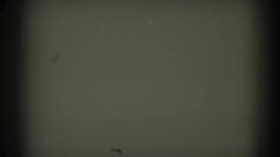 1962 Glendale 8mm frame dominated by a dim gray-green field, dark vertical banding, dust, and aged-film grain.