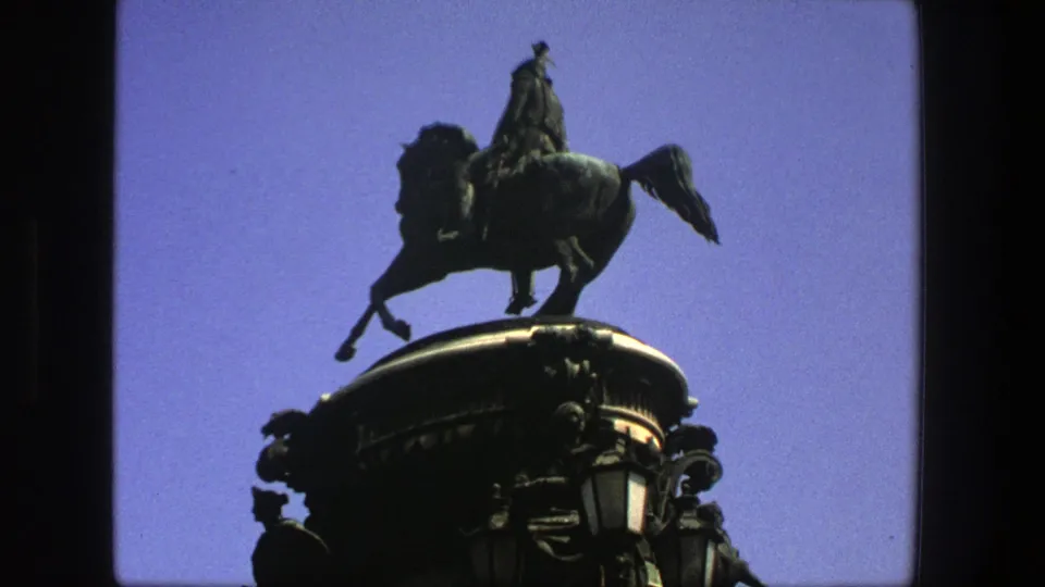 1975 Denmark 8mm frame with the rider-on-horse monument centered high above a rounded ornamental base.