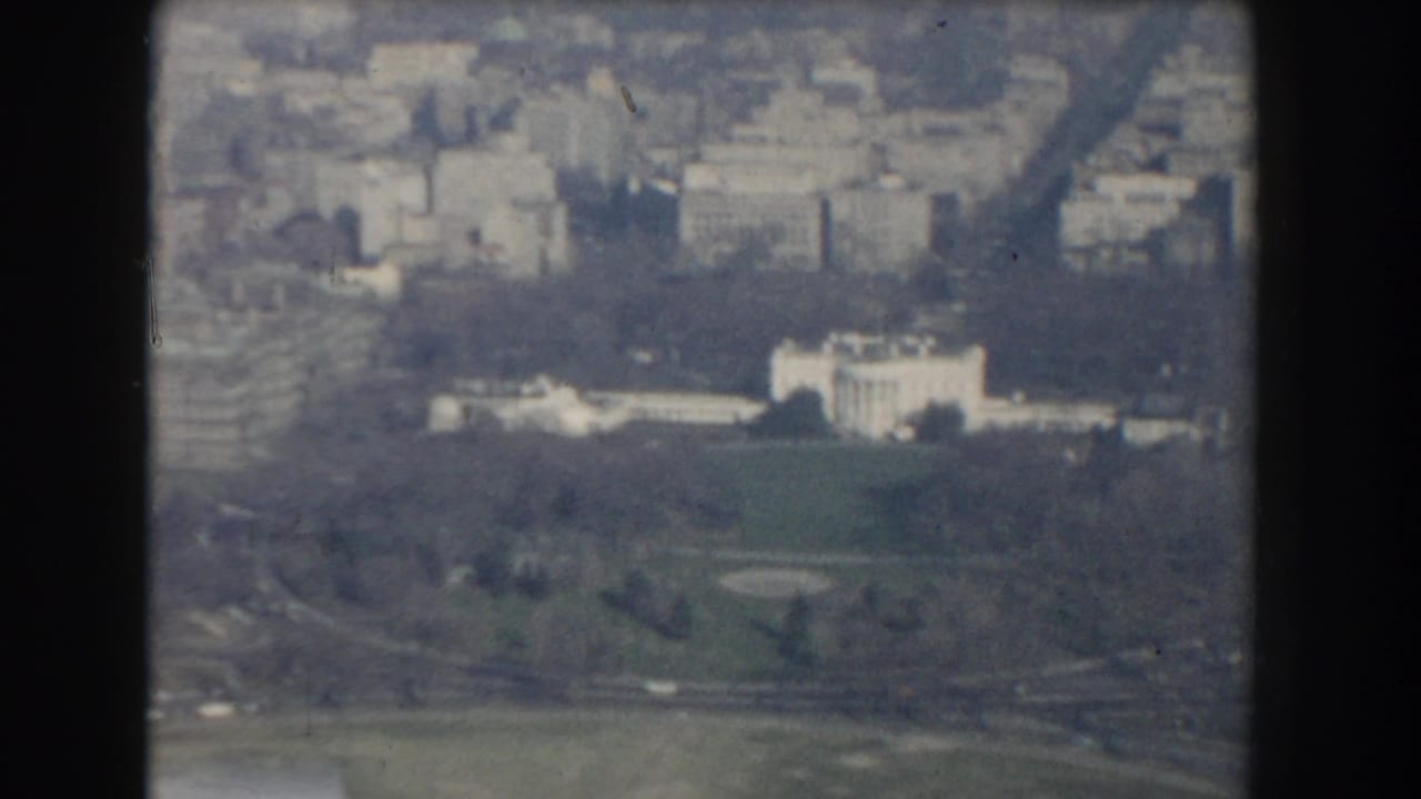 Aerial view of the White House grounds and surrounding Washington, DC buildings.