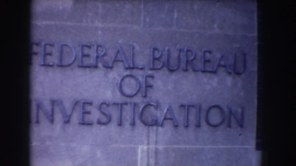 Close 8mm frame of the Federal Bureau of Investigation inscription on the Washington, DC building facade.