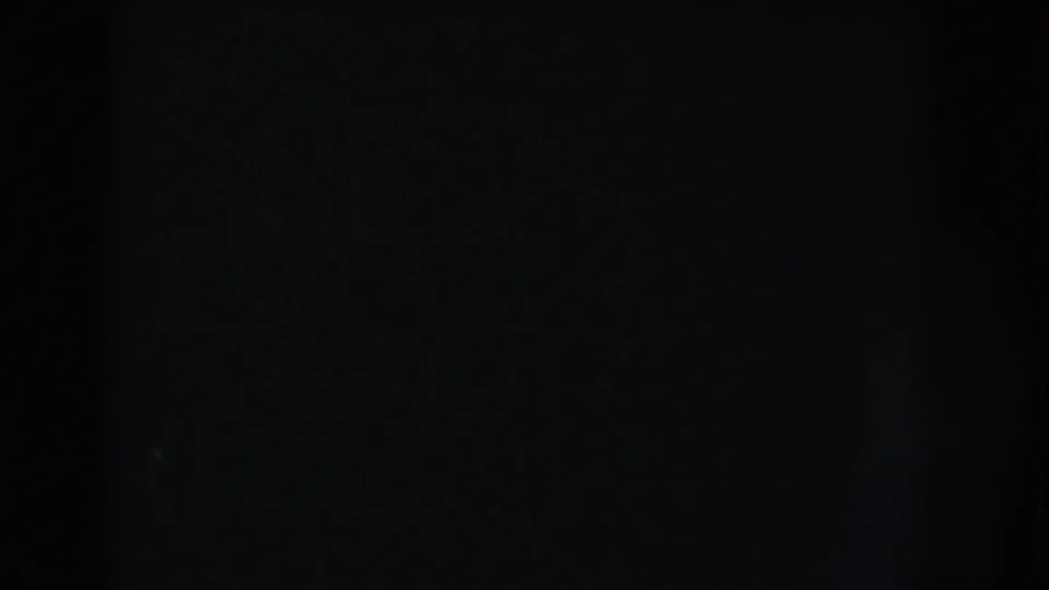 The final contact-sheet cell is largely dark, with no clear museum detail visible beyond the film-frame area.