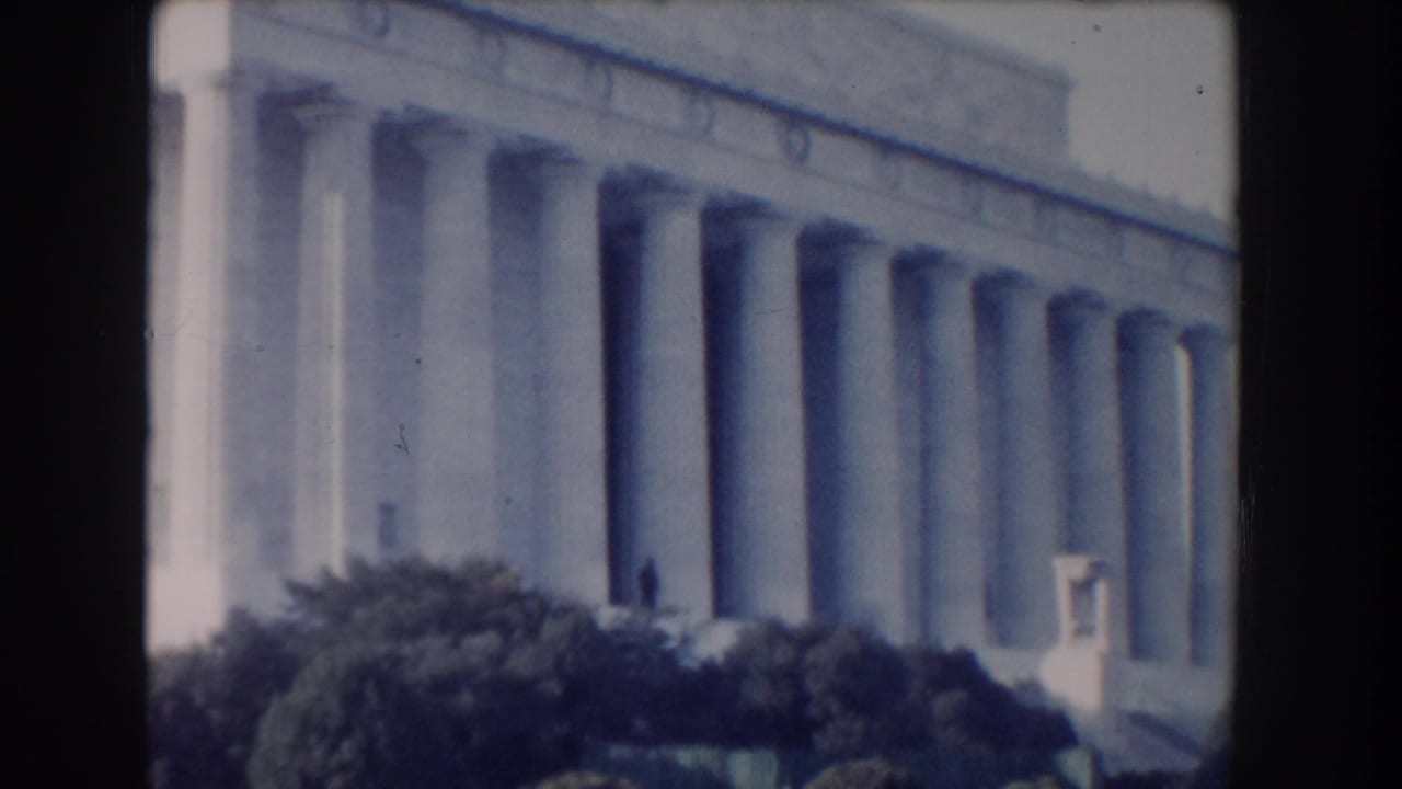 Lincoln Memorial columns seen in soft-focus 8mm footage.