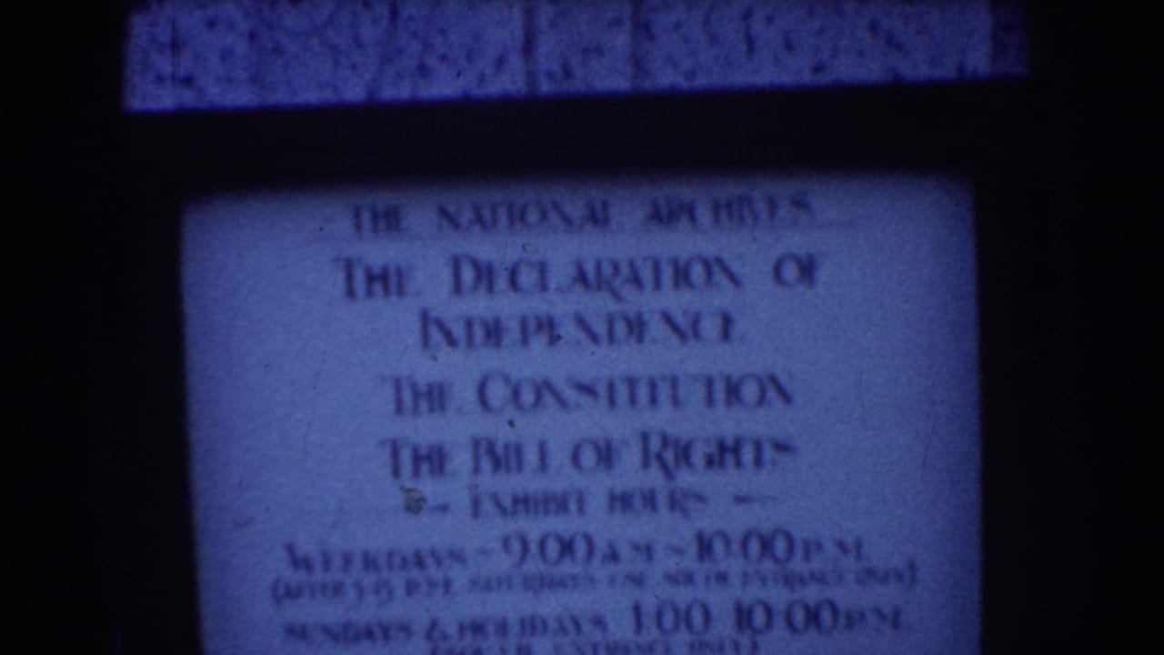 National Archives exhibit sign listing founding documents and hours.