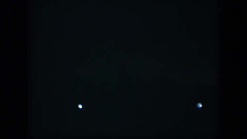 The final 1951 Cuba night frame is mostly dark, with a few small blue-white lights visible near the lower portion.