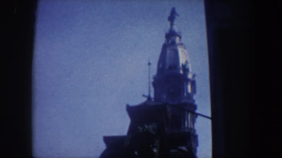 1962 Philadelphia 8mm view of a tower spire and finial, softly focused and framed by dark edges.