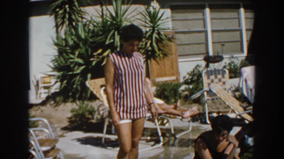 A North Hollywood backyard pool scene shows the striped-swimsuit woman with loungers, plants, and seated bathers around the patio.