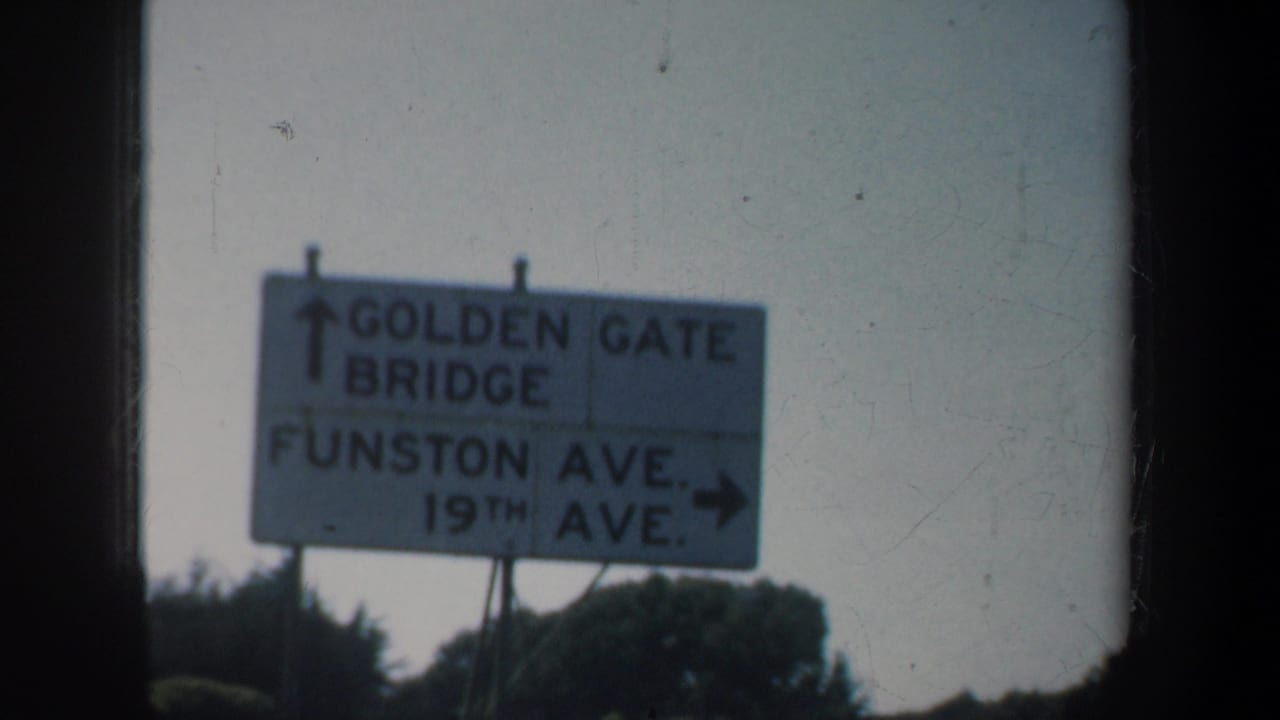 Road sign pointing toward Golden Gate Bridge, Funston Ave., and 19th Ave.