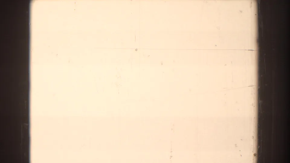 Overexposed 8mm frame from the 1959 Michigan clip, showing pale film surface, dark frame edges, and faint scratches.