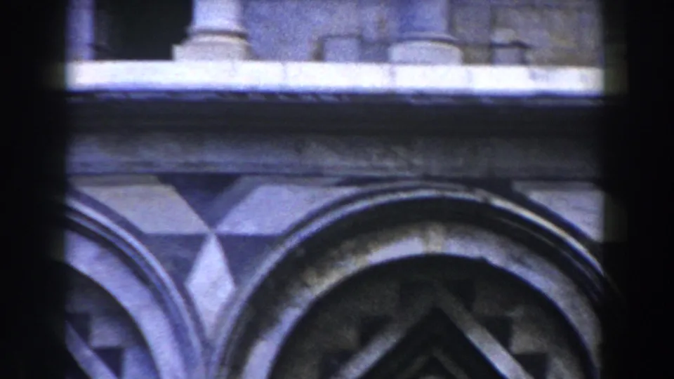 1959 Pisa home-movie view of columns, ledges, and large arched stone openings on a historic building.