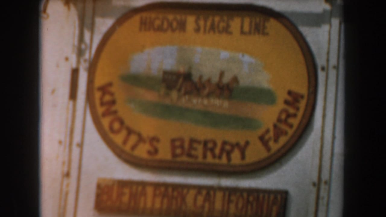 Yellow Knott's Berry Farm sign on a pale surface with Buena Park text below.