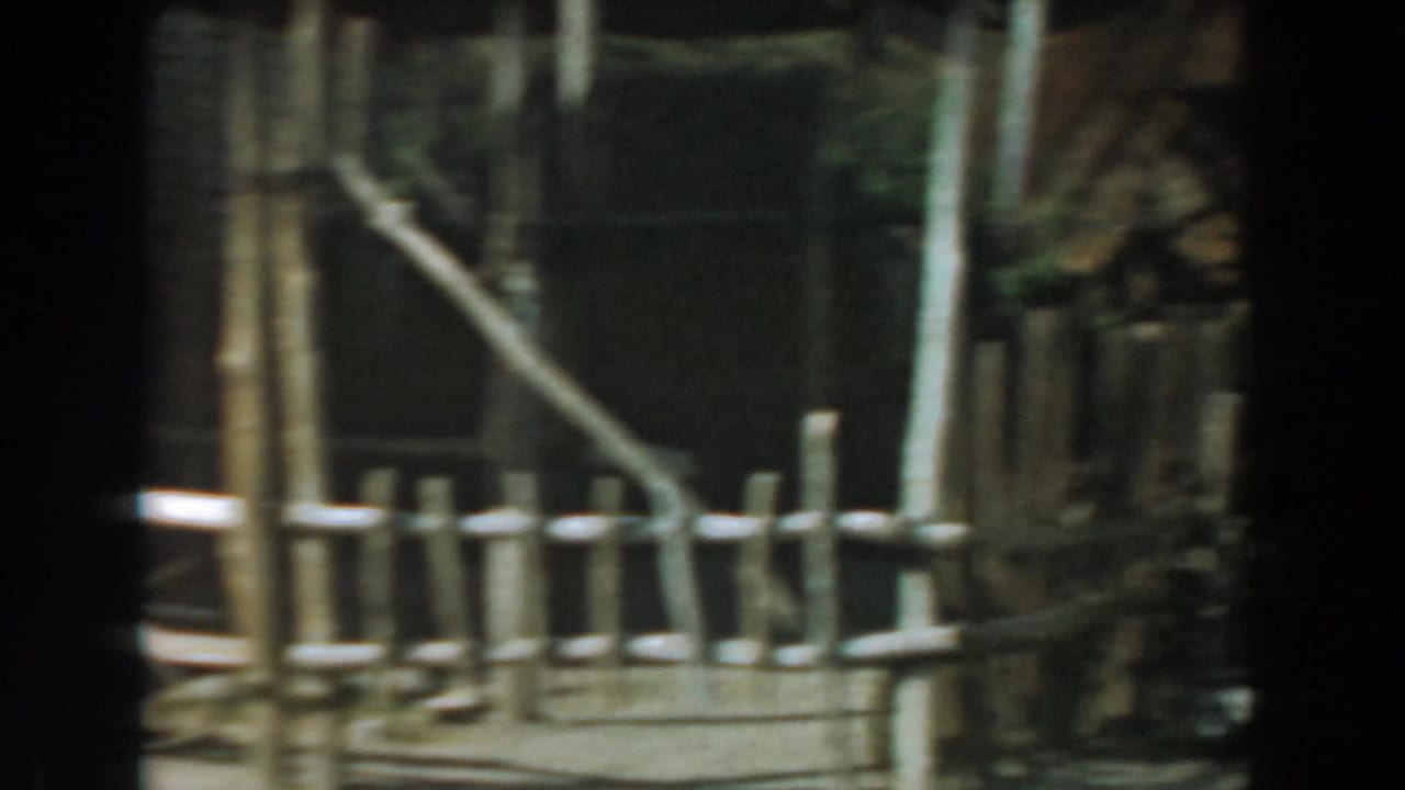 Rustic fence, wooden posts, and weathered building details in an Old West set.
