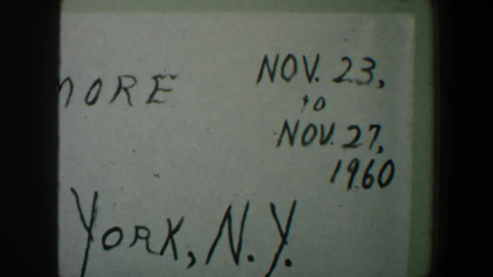 Cropped 1960 8mm title-card frame with the November 23 to November 27 date range and partial New York wording.