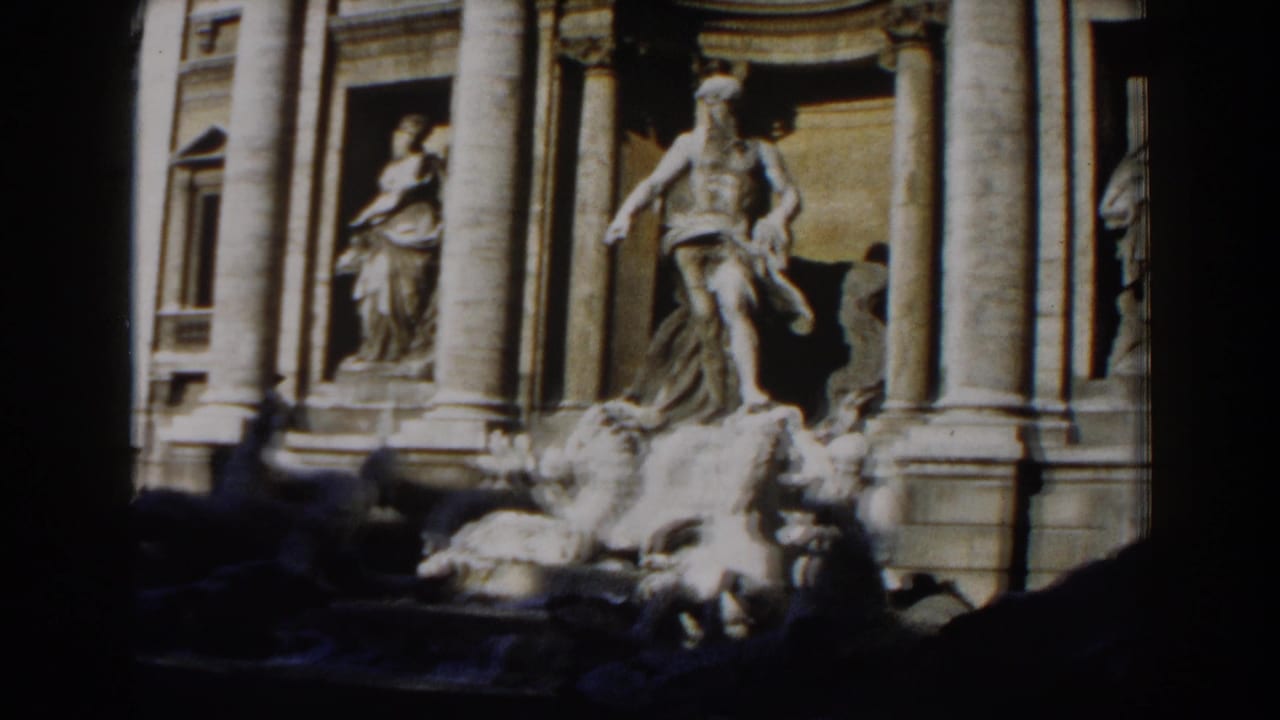 1959 Rome 8mm view of Trevi Fountain marble statuary, columns, niches, and fountain rockwork under daylight.