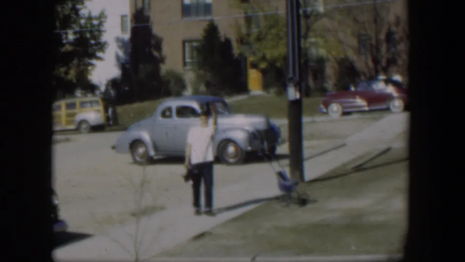 Near the end of the clip, the man faces back toward the camera area on a Nevada sidewalk, possibly in a goodbye gesture.