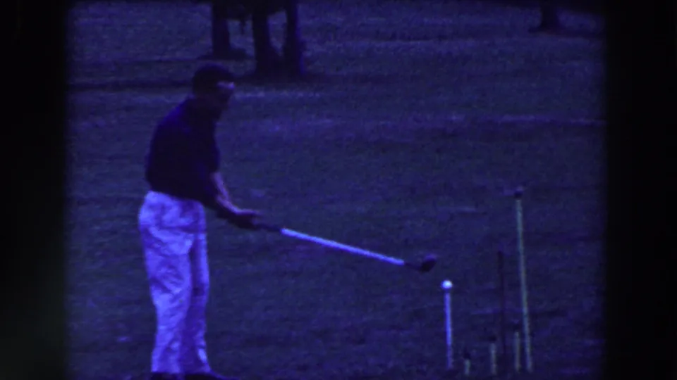 The Ridgefield lawn scene shows the man extending his croquet mallet toward a white ball, with stakes nearby.