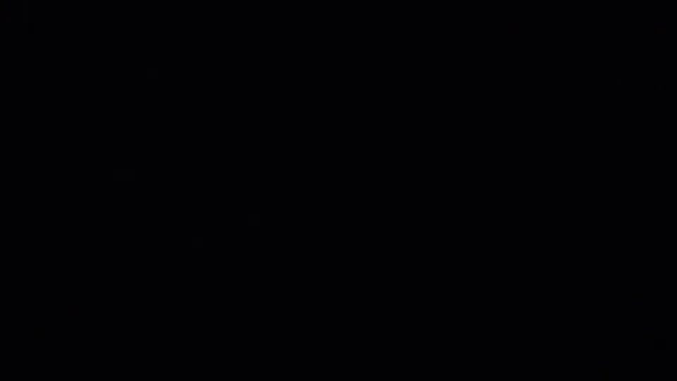 Dark end frame from the 1957 Lubbock-area 8mm clip, with the field image largely faded to black.