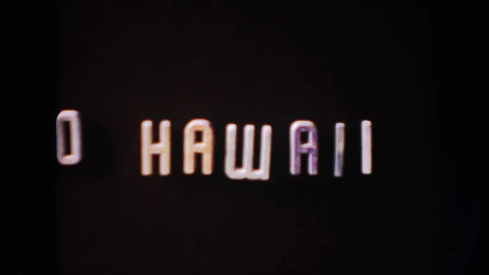 The Hawaii title card is shown closer to completion, with raised letters spelling part of ON TO HAWAII against a dark background.